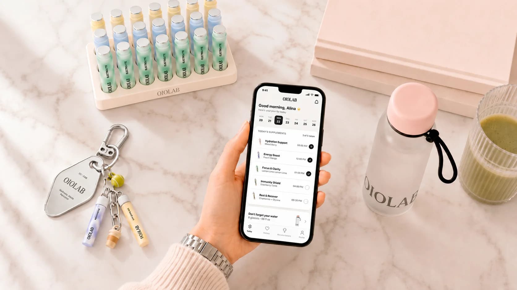 A single 010LAB bottle on a clean marble surface